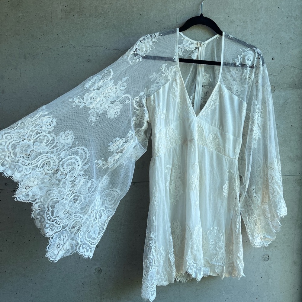 Jen’s Pirate Booty | stunning white lace, bell sleeve, short dress